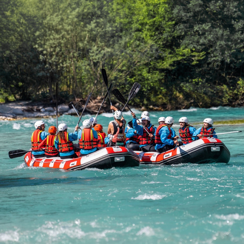 Team on a river rafting outdoor team building day